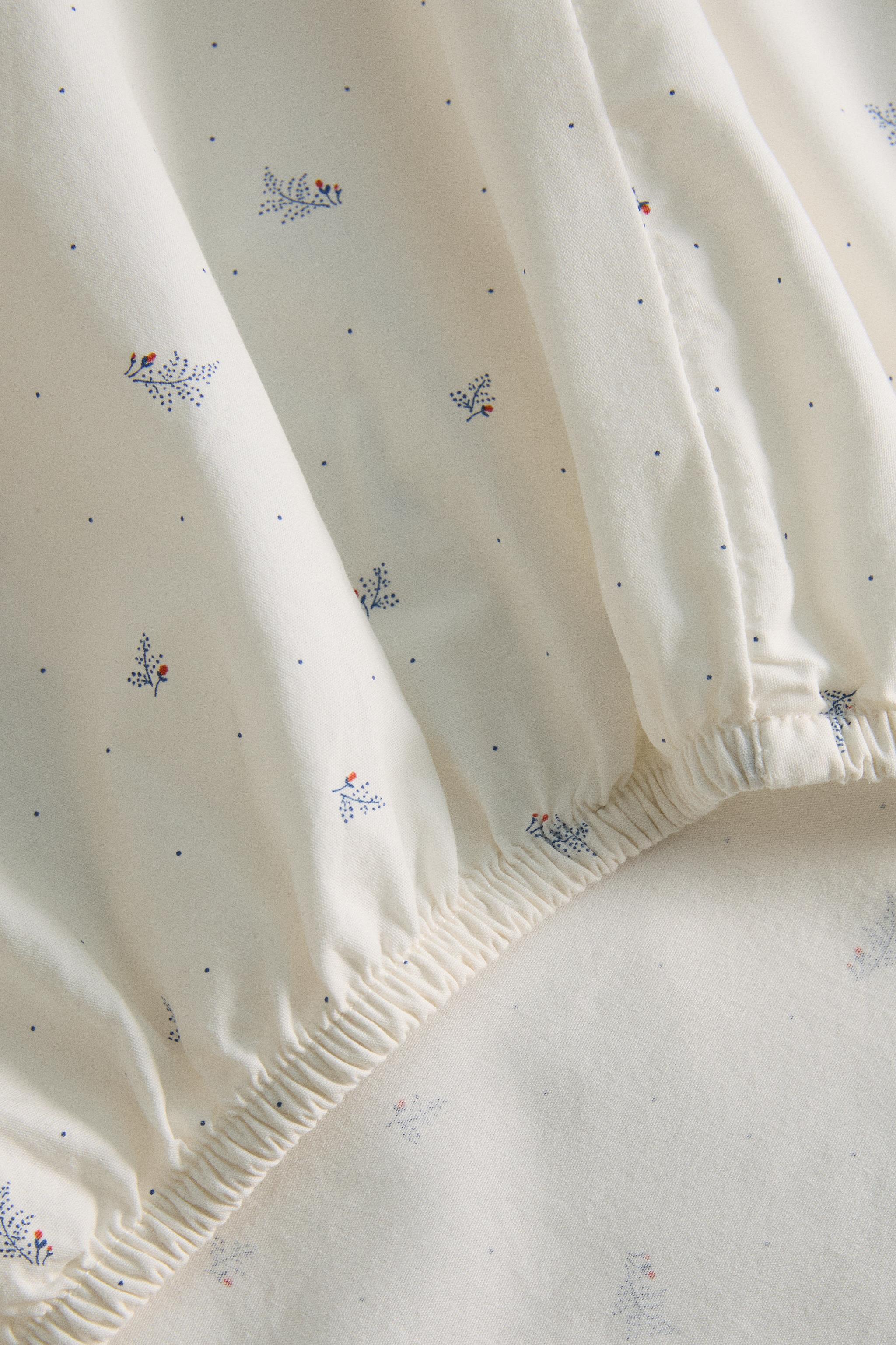 KIDS' COTTON FITTED SHEET WITH LEAVES AND DOTS